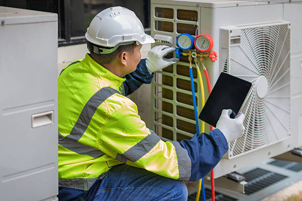 Professional Heat Pump Repair technician working in Ancram, NY